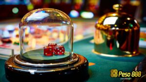 3 red dice inside a dice shaker on sic bo table