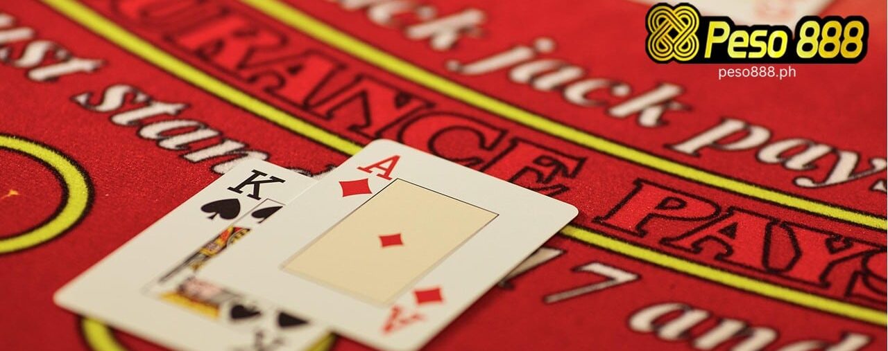 A king and ace card on a blackjack table