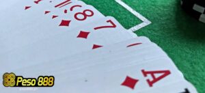 a group of casino cards on a table